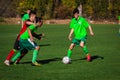 Teens playing football